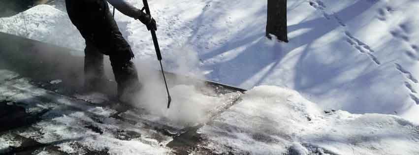 Ice dam removal using low-pressure steam in Minnesota